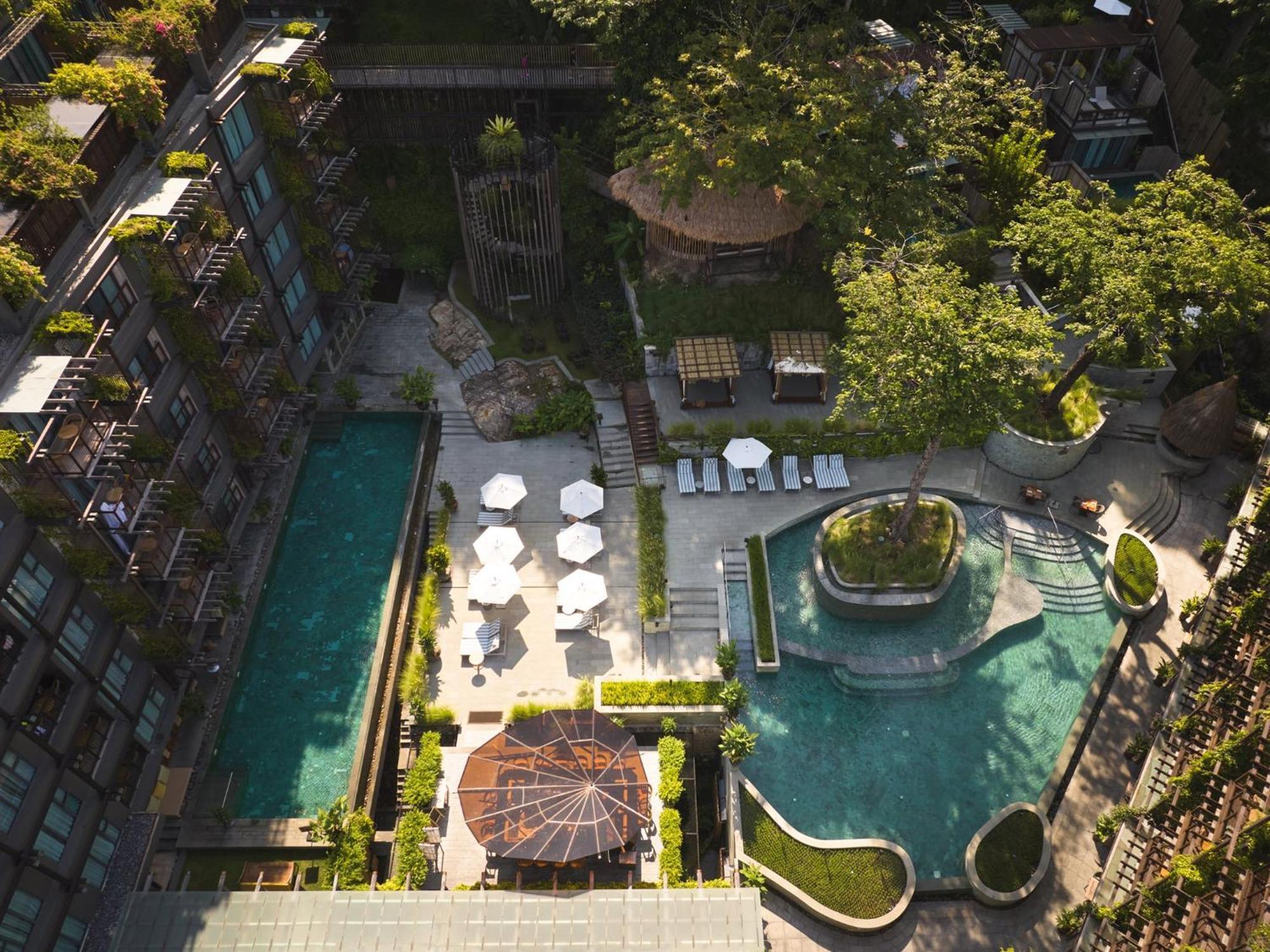 Dinso Resort & Villas Phuket, Vignette Collection By Ihg Patong Exterior photo The swimming pool at the hotel